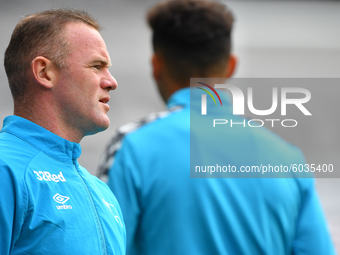  
Wayne Rooney of Derby County warms up ahead of kick-off during the Sky Bet Championship match between Derby County and Blackburn Rovers a...