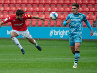  
Jason Lowe of Salford City FC heads the ball away during the Sky Bet League 2 match between Salford City and Forest Green Rovers at Moor L...