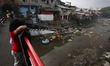 Indonesian children playing at the Ciliwung river in Bogor, West Java, 27 September 2020....