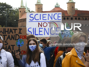 Students and supporters attend 'Krakow For Climate Justice' protest organized by Fridays for Future movement also known as Youth Strike for...