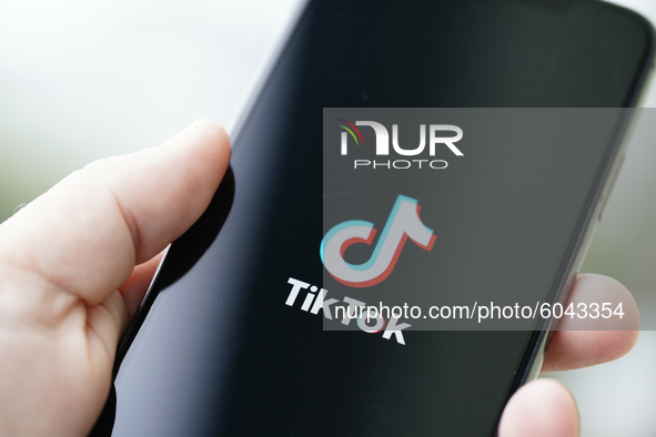 The TikTok logo is seen on an iPhone 11 Pro max in this photo illustration in Warsaw, Poland on September 29, 2020. The TikTok app will be b...