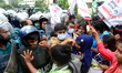 Activists of Socialist Student Front to break police barricades to a March for submit memo...