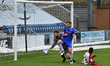   Colchester United's Dean Gerken and Tommy Smith  and Oldham Athletic's Dylan Fage during...