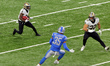 New Orleans Saints wide receiver Deonte Harris (11) runs the ball under the pressure of De...