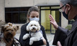Parishioners accompanied by their pets attend a mass on the occasion of St. Francis of Ass...