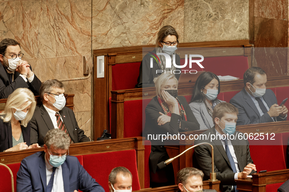 Member of Parliament Marine Le Pen (C)  attends at the session of the questions for the government (QAG) at French National Assembly  in Par...