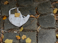 A protective mask left on the street, in Sofia center.
The number of people infected with COVID-19 in Bulgaria is increasing, with the highe...