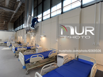 Hospital beds at a temporary medical facility for COVID-19 patients deployed at the Lenexpo Exhibition Center in St. Petersburg, Russia, on...