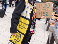 Environmentalists, including members of Extinction Rebellion protest against the High Speed 2 project at Euston Station, London, England on...