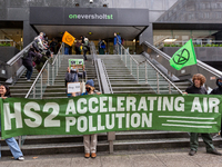 Environmentalists, including members of Extinction Rebellion protest against the High Speed 2 project in front of Eversholf Street office bu...