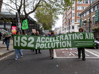 Environmentalists, including members of Extinction Rebellion protest against the High Speed 2 project in front of Eversholf Street office bu...