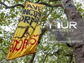 Environmentalists, including members of Extinction Rebellion protest against the High Speed 2 project at Euston park, London, England on Oct...