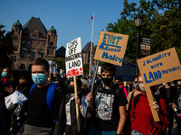 As part of a national day of action, members of the Six Nations and allies march from Queens Park down University Avenue demanding an end to...