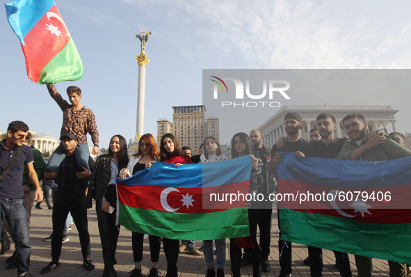 Azerbaijanis who live in Ukraine wave Azerbaijan's flag during their rally in support Azerbaijan against Armenia in the Nagorno-Karabakh con...