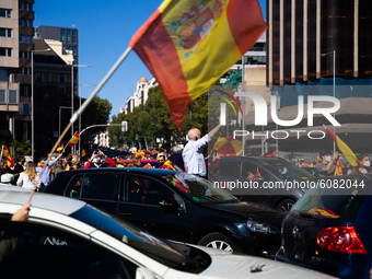 Demonstration for the national day of Spain in Madrid, called by VOX on the Paseo de la Castellana and against the government for activating...