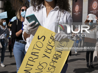 Healthcare workers gather at Puerta del Sol  during a demonstration calling for better conditions amid the coronavirus pandemic, in Madrid,...