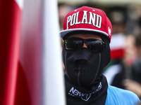 Anti-face mask protesters and coronavirus skeptics attend Anti-Covid Freedom March in Krakow, Poland on October 10, 2020. Demonstrators gath...