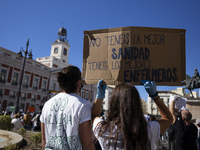 Healthcare workers gather at Puerta del Sol  during a demonstration calling for better conditions amid the coronavirus pandemic, in Madrid,...