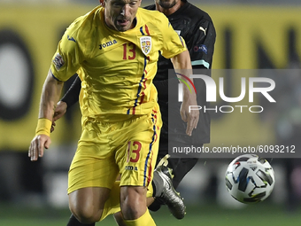 Claudiu Keseru of Romania in action against Martin Hinteregger of Austria  during the UEFA Nations League match between Romania v Austria, i...