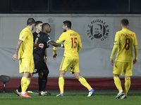 David Alaba of Austria in action against Andrei Burca of Romania during the UEFA Nations League match between Romania v Austria, in Ploiesti...