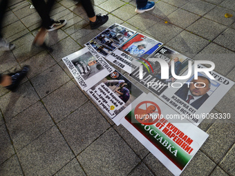 People walk by posters related to Prime Minister Boyko Borissov left on the street in Burgas city center.
Bulgarians have been demonstrating...