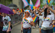 Participants and spectators took to the streets honoring LGBTQ rights during the 2019 Gay...