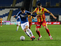Matic Kotnik of Brescia and Mariusz Stepinski of Lecce  in action during the match between Brescia and Lecce for the Serie B at Stadio Mario...