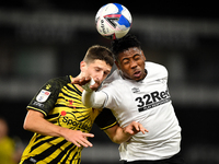 
Craig Cathcart of Watford  and Jahmal Hector-Ingram of Derby County clash heads during the Sky Bet Championship match between Derby County...