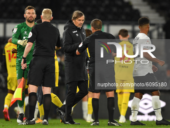 
Derby County manager, Philip Cocu talks with Referee Geoff Eltringham during the Sky Bet Championship match between Derby County and Watfor...