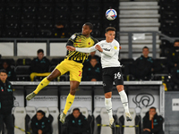 
Lee Buchanan of Derby County battles with Christian Kabasele of Watford during the Sky Bet Championship match between Derby County and Watf...