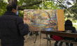 A painter during the celebration of the XVI El Capricho National Painting Contest in autum...