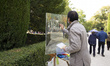 A painter during the celebration of the XVI El Capricho National Painting Contest in autum...