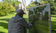 A painter during the celebration of the XVI El Capricho National Painting Contest in autum...