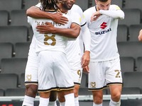 Cameron Jerome celebrates after scoring for Milton Keynes Dons, to take the lead making it 1 - 0 against Gillingham, during the Sky Bet Leag...