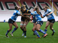 Holly Thorpe and Kenny Thomas of Darlington Mowden Park Sharks and Amelia Buckland-Hurry of Worcester Warriors Women during the WOMEN'S ALLI...