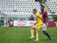 Marko Rog of Cagliari Caldio and  Soualiho Meite of Torino FC  during the Serie A football match between Torino FC and Cagliari Calcio at Ol...