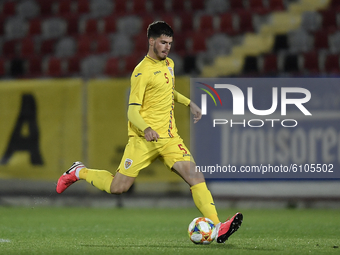 Tudor Baluta of Romania in action during the soccer match between Romania U21 and Malta U21 of the Qualifying Round for the European Under-2...