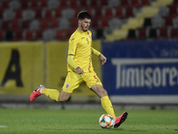 Tudor Baluta of Romania in action during the soccer match between Romania U21 and Malta U21 of the Qualifying Round for the European Under-2...
