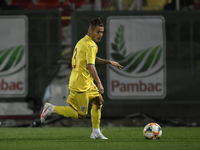 Alexandru Matan of Romania in action during the soccer match between Romania U21 and Malta U21 of the Qualifying Round for the European Unde...