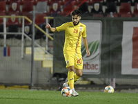 Andrei Ciobanu of Romania in action during the soccer match between Romania U21 and Malta U21 of the Qualifying Round for the European Under...