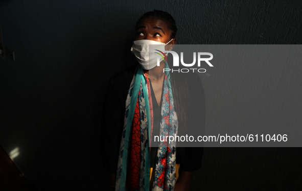 A Palestinian girl wearing a face mask amid the Covid-19 pandemic at her home in Gaza city, on October 20, 2020.  