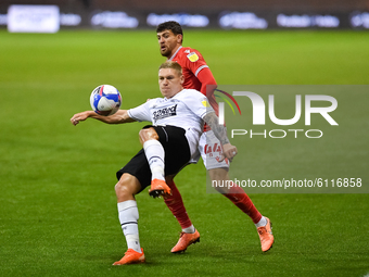 
Martyn Waghorn of Derby County holds off Nicolas Ioannou of Nottingham Forest during the Sky Bet Championship match between Nottingham Fore...