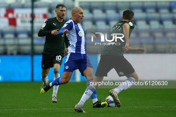 Wigans Kal Naismith charges forwar during the Sky Bet League 1 match between Wigan Athletic and Plymouth Argyle at the DW Stadium, Wigan on...