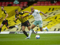  William Troost-Ekong of Watford  and Joshua King of Bournemouth during the Sky Bet Championship match between Watford and Bournemouth at Vi...