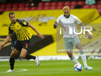  William Troost-Ekong of Watford  and Joshua King of Bournemouth during the Sky Bet Championship match between Watford and Bournemouth at Vi...