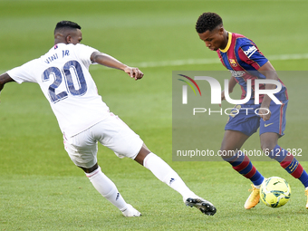 Ansu Fati and Vinicius Junior during the match between FC Barcelona and Real Madrid CF, corresponding to the week 7 of the Liga Santander, p...
