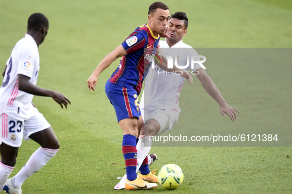 Sergino Dest and Carlos Casemiro	 during the match between FC Barcelona and Real Madrid CF, corresponding to the week 7 of the Liga Santande...