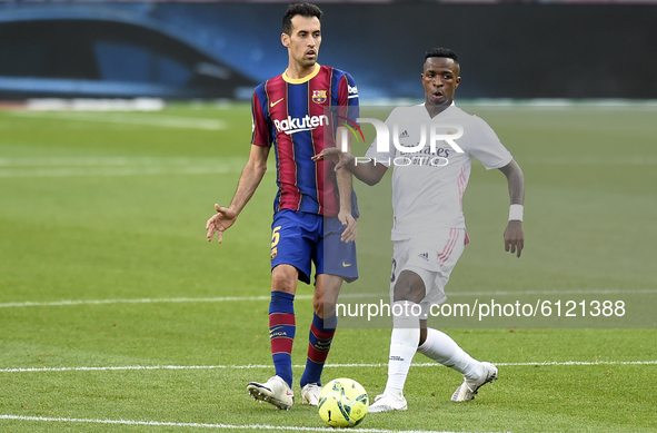 Sergio Busquets and Vinicius Junior  during the match between FC Barcelona and Real Madrid CF, corresponding to the week 7 of the Liga Santa...