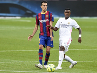 Sergio Busquets and Vinicius Junior  during the match between FC Barcelona and Real Madrid CF, corresponding to the week 7 of the Liga Santa...