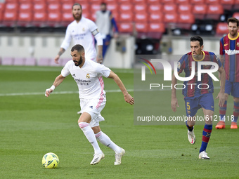 Karim Benzema and Sergio Busquets during the match between FC Barcelona and Real Madrid CF, corresponding to the week 7 of the Liga Santande...